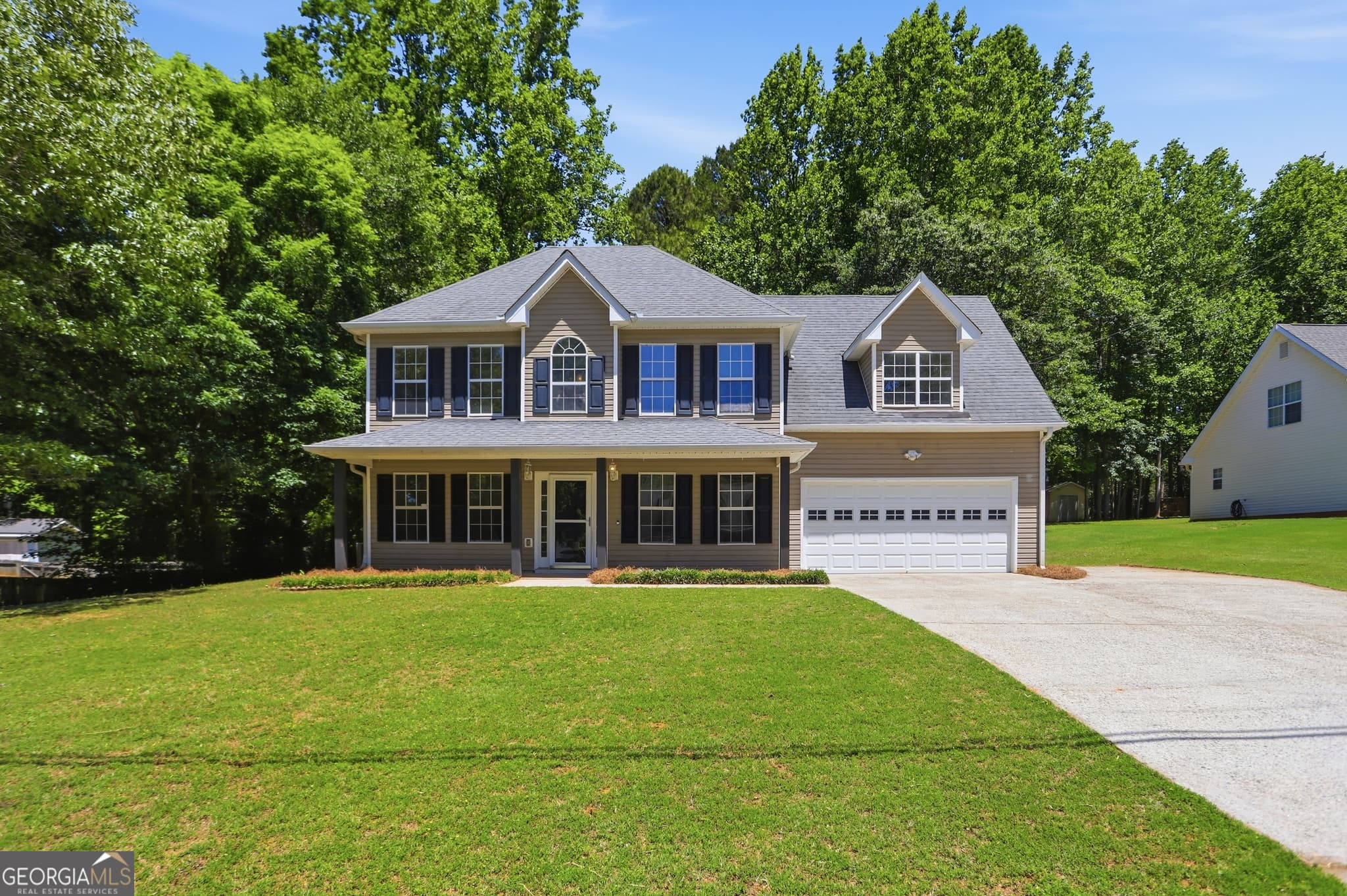 4 bedroom, 2.5 bathroom, 2,498 sq ft single family residence sold at 7318 Coral Lake Drive, Flowery Branch, GA 30542