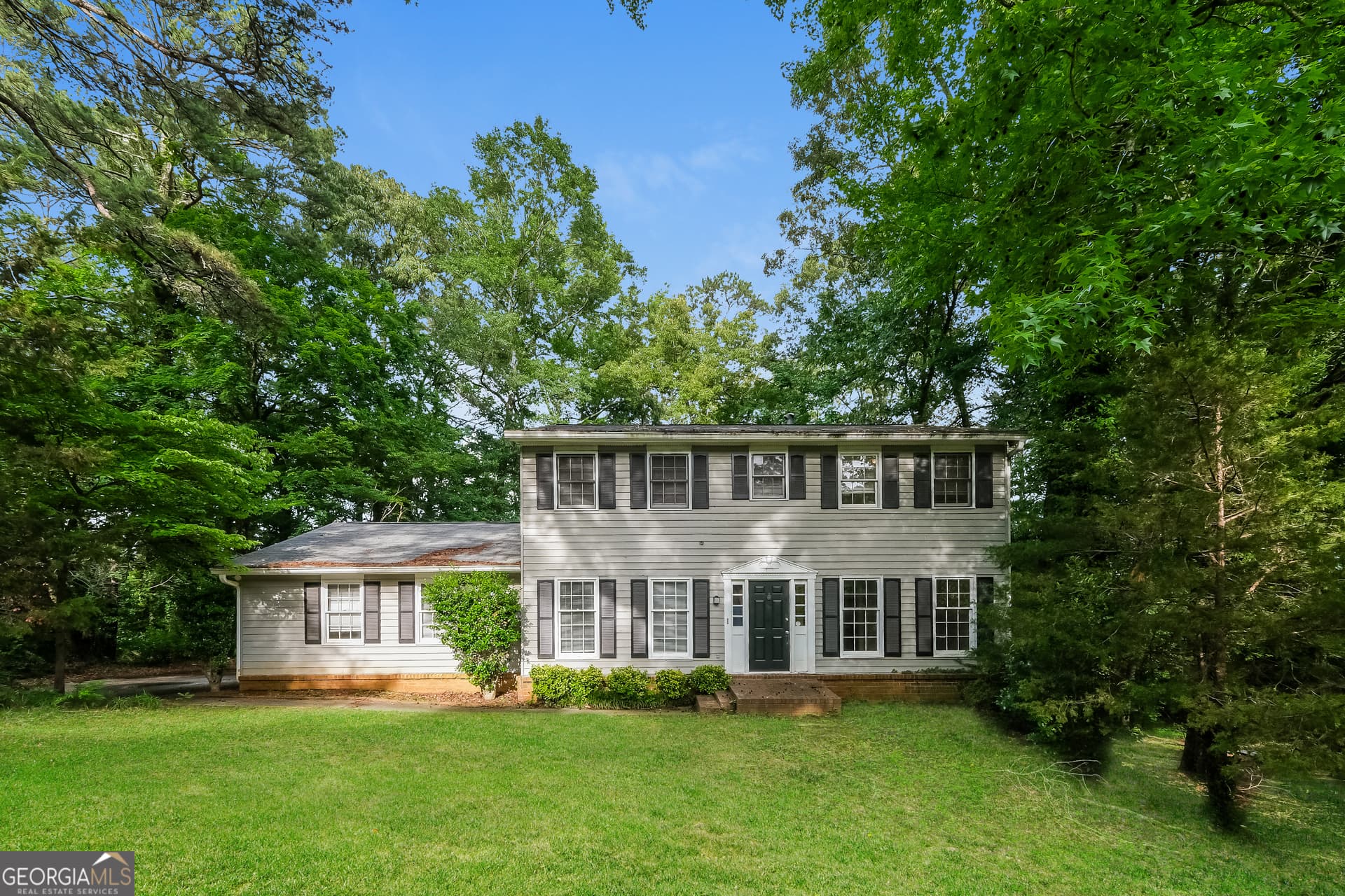 4 bedroom, 2.5 bathroom, 2,178 sq ft single family residence for sale at 1672 Briarbend Court, Stone Mountain, GA 30088