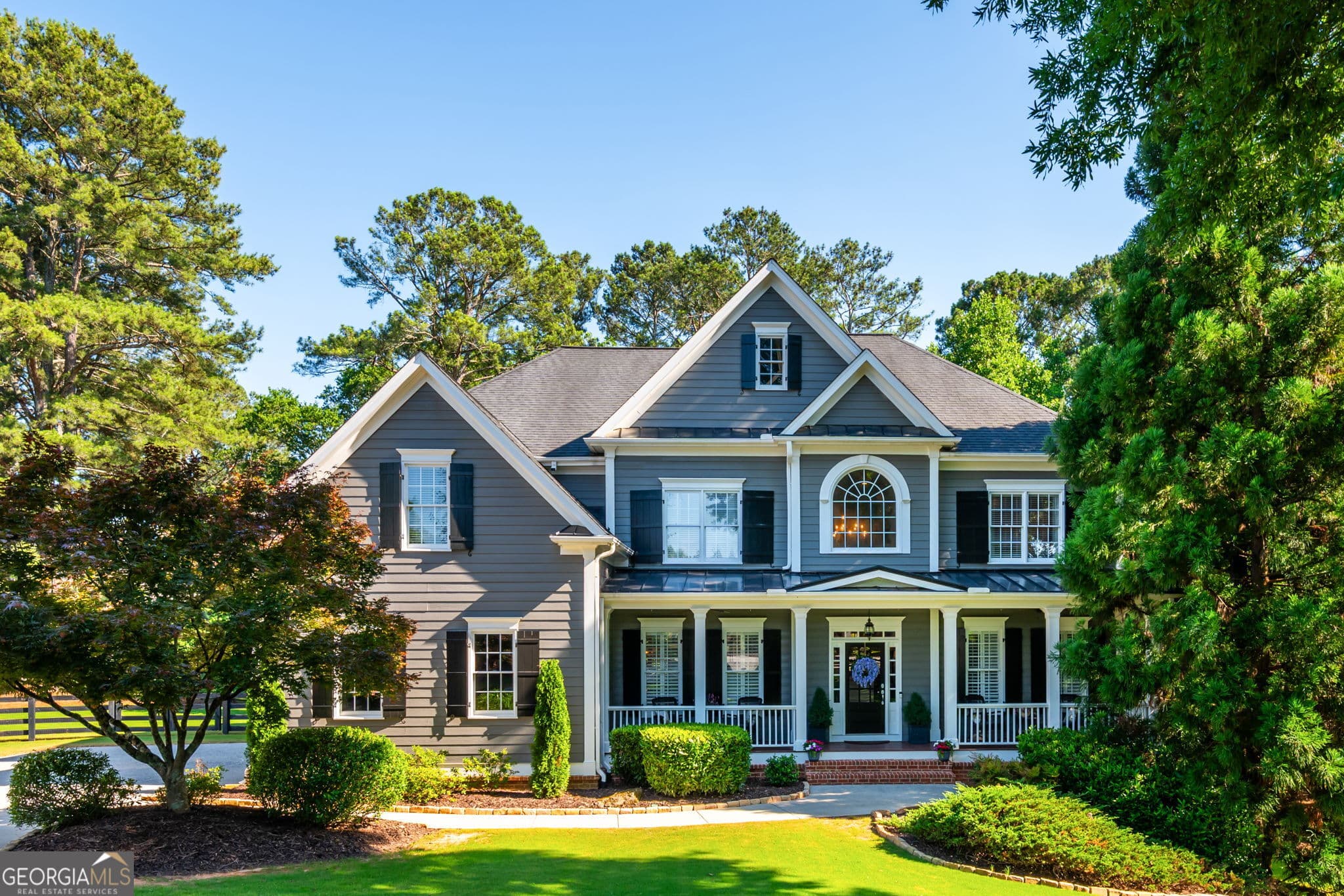 6 bedroom, 5.5 bathroom, 6,657 sq ft single family residence sold at 320 Sweet Gum Circle, Milton, GA 30004