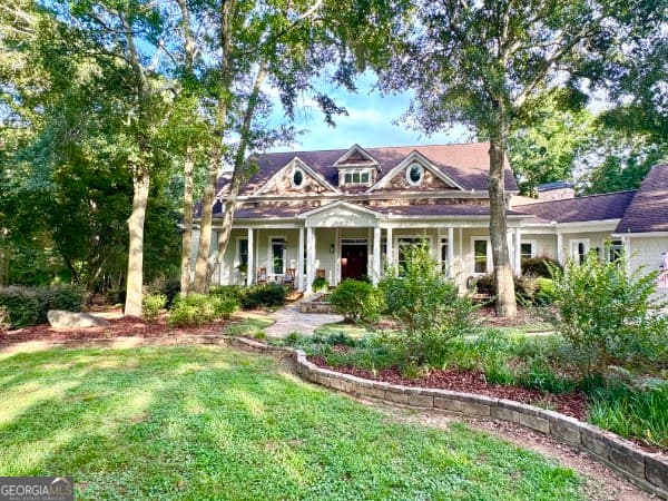 4 bedroom, 4 bathroom, 7,016 sq ft single family residence for sale at 1790 Lipscomb Lake Road, Pendergrass, GA 30567