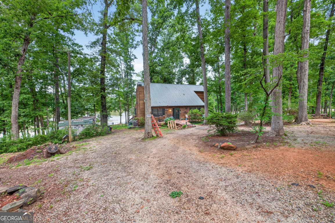 3 bedroom, 2 bathroom, 1,853 sq ft single family residence sold at 845 Bear Creek Marina Road, Mansfield, GA 30055