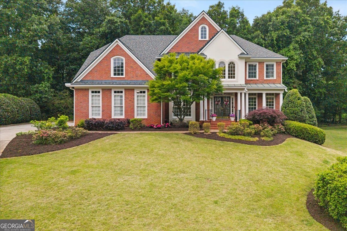 4 bedroom, 4.5 bathroom, 5,006 sq ft single family residence sold at 702 SE Cheswich Overlook, Marietta, GA 30067