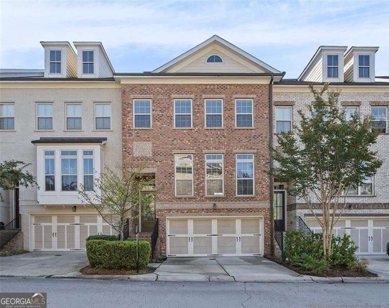 4 bedroom, 3.5 bathroom, 1,718 sq ft townhouse for sale at 1781 Kenstone Walk, Dunwoody, GA 30338