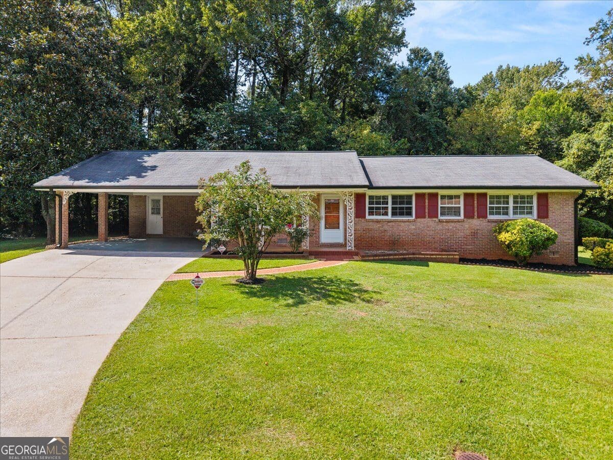 3 bedroom, 2 bathroom, 1,379 sq ft single family residence for sale at 3961 Camelot Court, Tucker, GA 30084
