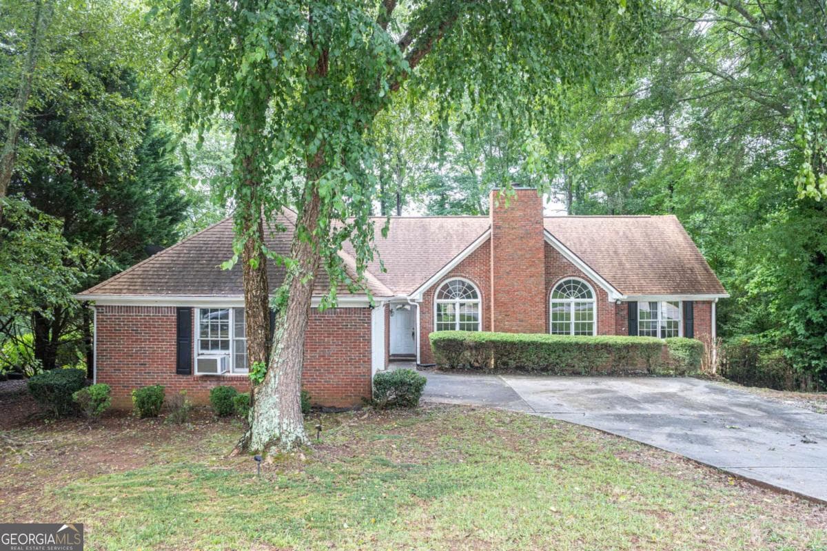 4 bedroom, 2 bathroom single family residence for sale at 1404 Glenfield Drive, Lawrenceville, GA 30043