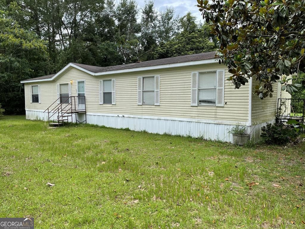 4 bedroom, 2 bathroom, 1,792 sq ft manufactured home,single family residence under contract at 7216 Old Adel Road, Moultrie, GA 31788