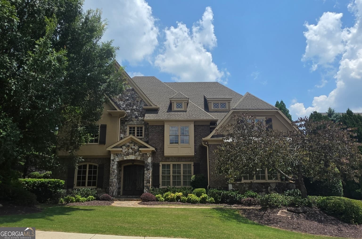5 bedroom, 7 bathroom, 9,562 sq ft single family residence sold at 2200 Heathermoor Hill Drive, Marietta, GA 30062