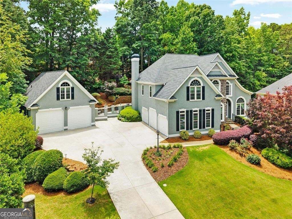 5 bedroom, 4 bathroom, 5,465 sq ft single family residence for sale at 5021 Towne Lake Hills, Woodstock, GA 30189