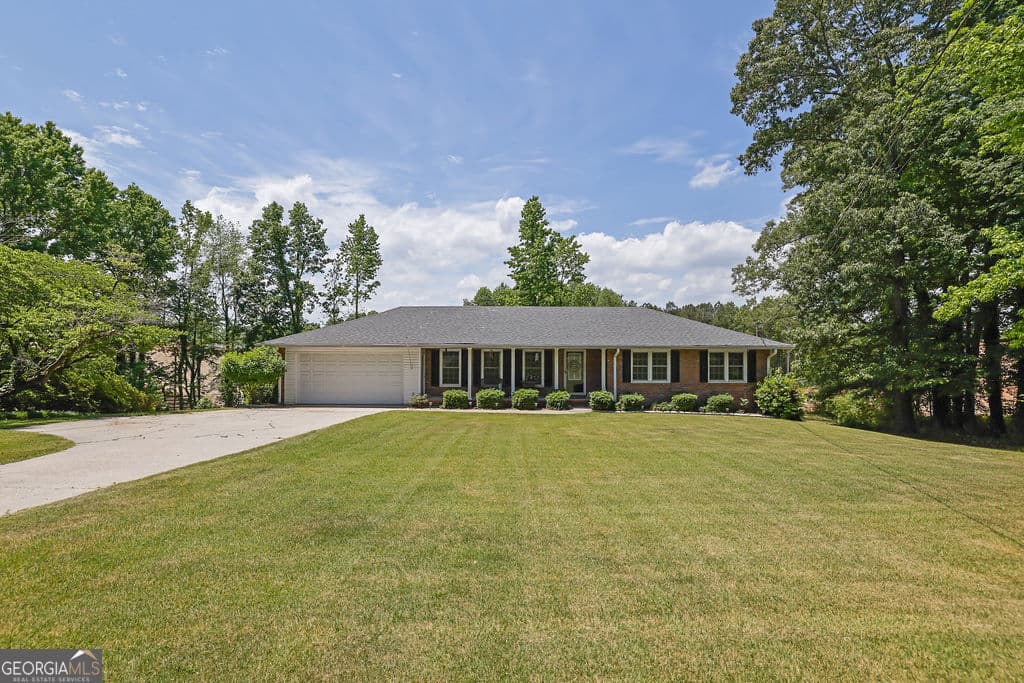 3 bedroom, 2 bathroom, 1,588 sq ft single family residence sold at 2525 Holtzclaw Road, Cumming, GA 30041