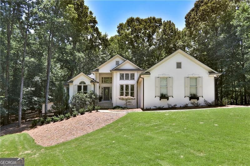 4 bedroom, 3 bathroom, 3,186 sq ft single family residence sold at 1312 Oak Bluff Court, Canton, GA 30114