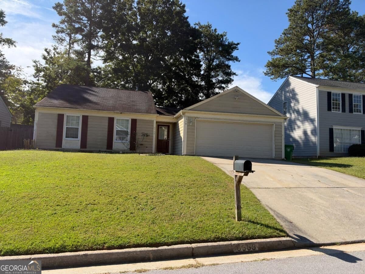 3 bedroom, 2 bathroom, 1,440 sq ft single family residence for sale at 6568 Eastbriar Drive, Lithonia, GA 30058