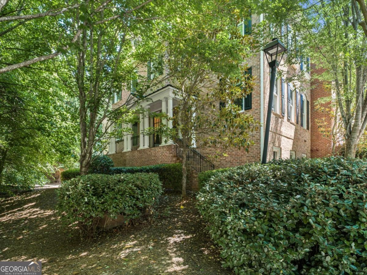 4 bedroom, 3.5 bathroom, 2,970 sq ft townhouse sold at 1207 New Haven Court, Roswell, GA 30075