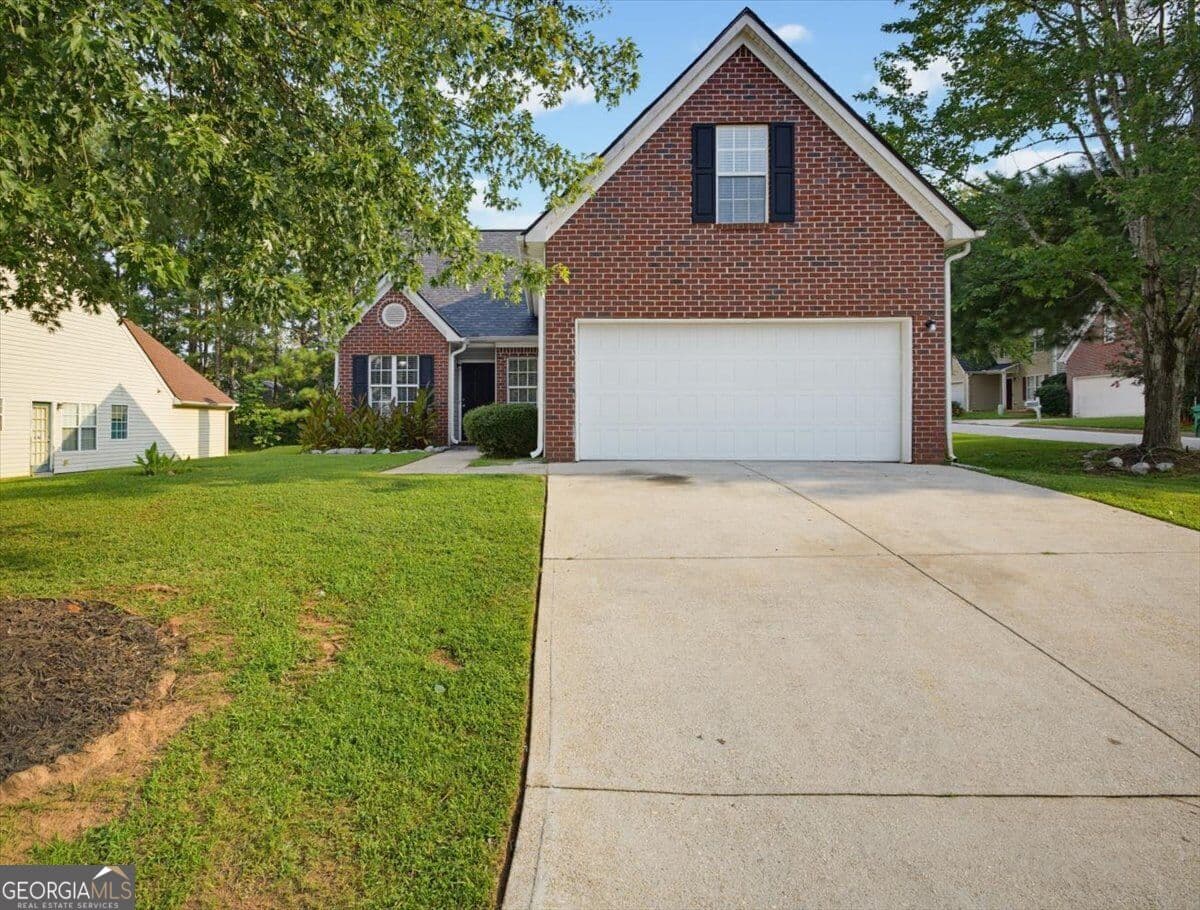 4 bedroom, 2.5 bathroom, 1,963 sq ft single family residence sold at 6563 Lake Mill Trace, Lithonia, GA 30038