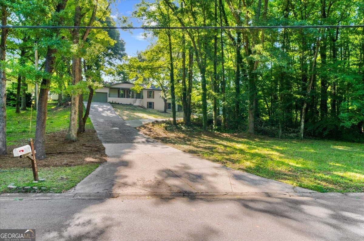 3 bedroom, 3.5 bathroom, 2,630 sq ft single family residence sold at 1661 Oak Ridge Circle, Stone Mountain, GA 30087