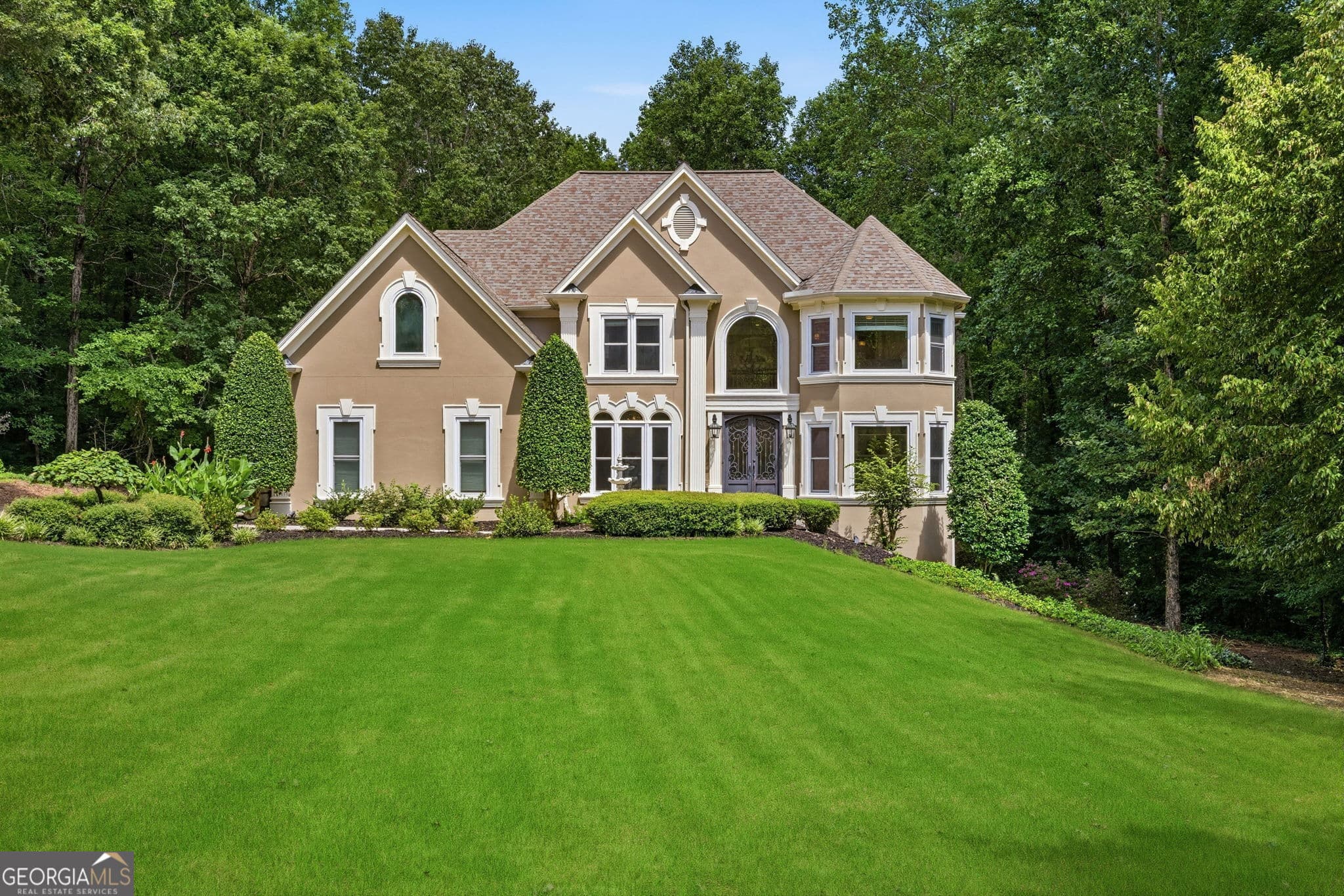 7 bedroom, 5 bathroom, 6,086 sq ft single family residence sold at 1406 Lull Water Court, Hoschton, GA 30548