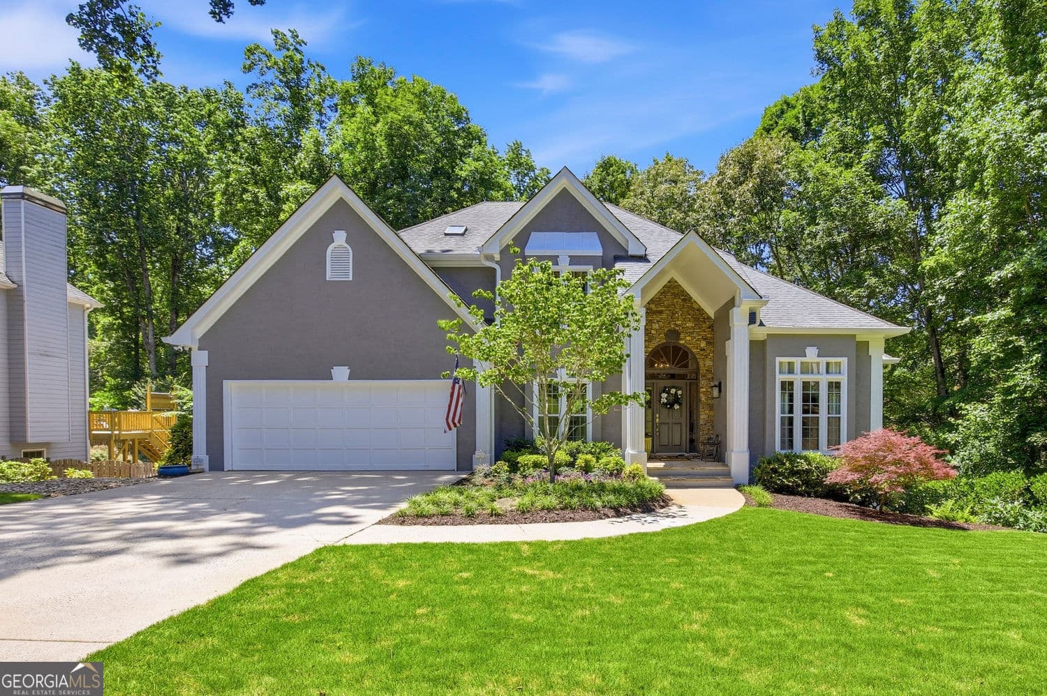 4 bedroom, 3.5 bathroom, 4,638 sq ft single family residence sold at 101 Oakwood Hills Drive, Suwanee, GA 30024