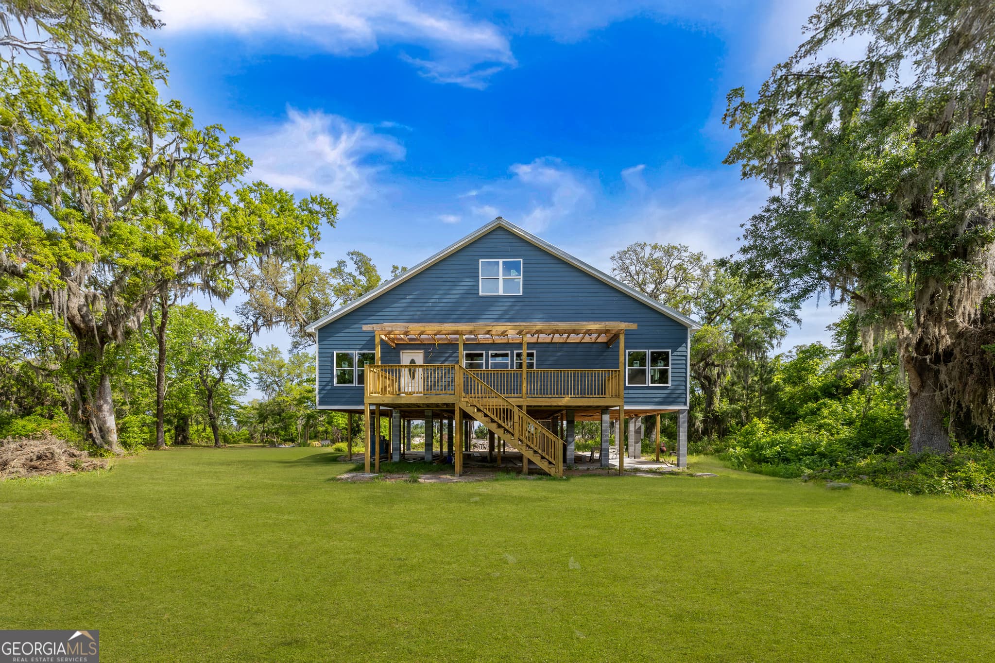 5 bedroom, 4.5 bathroom, 3,434 sq ft single family residence sold at 67 Bermuda Bluff Lane, Midway, GA 31320