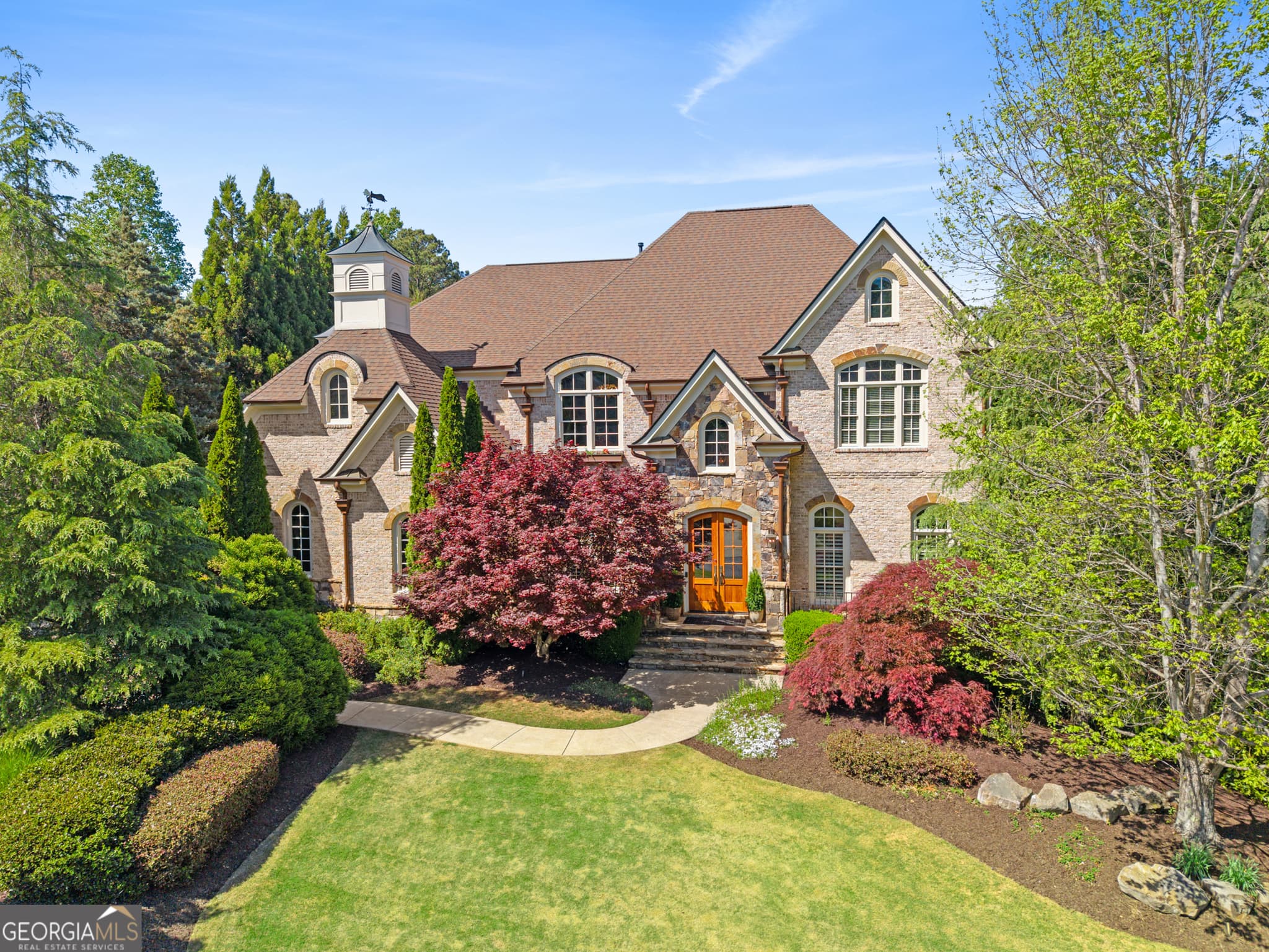 6 bedroom, 5.5 bathroom, 7,834 sq ft single family residence for sale at 3080 Creek Tree Lane, Cumming, GA 30041
