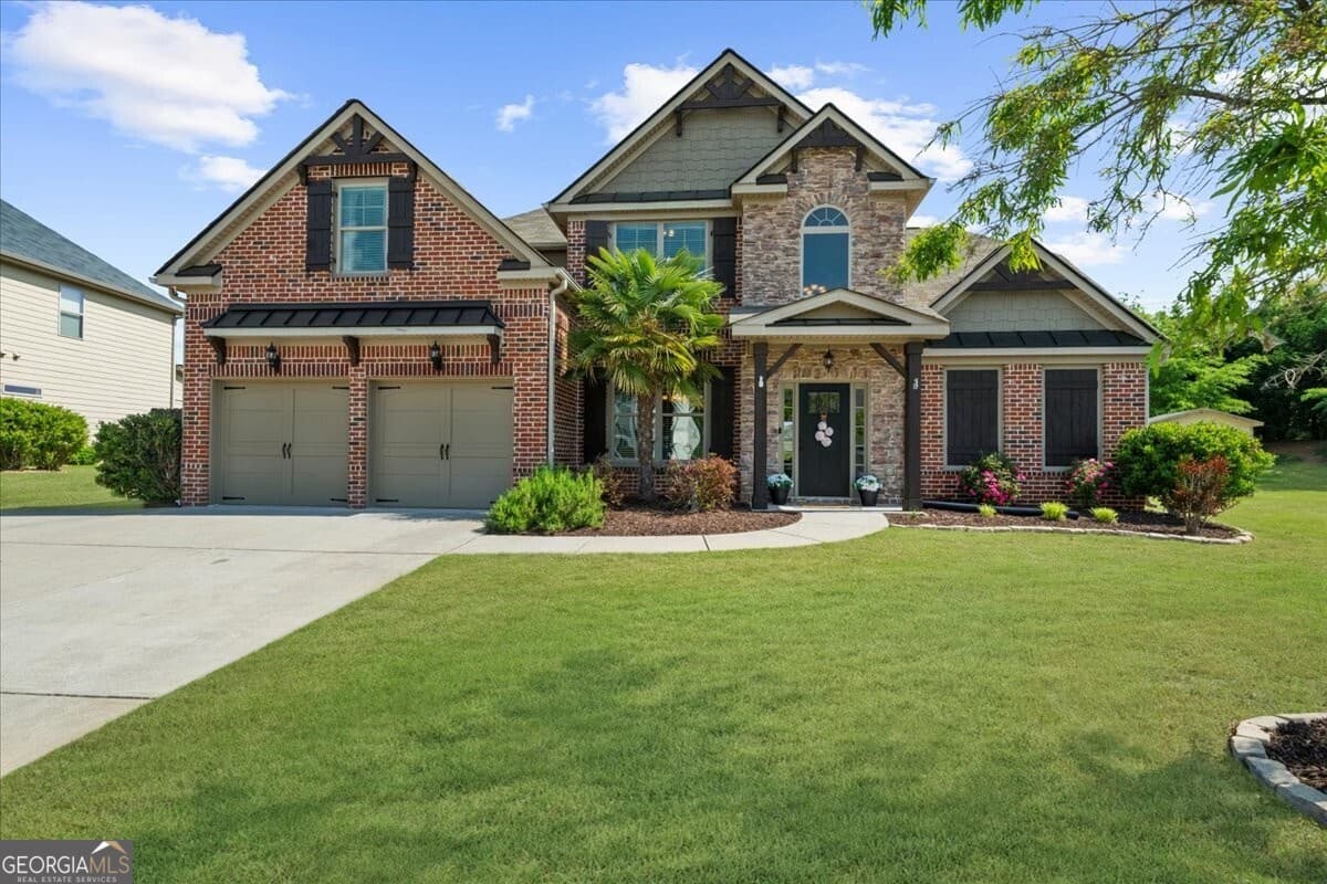 5 bedroom, 3.5 bathroom, 3,091 sq ft single family residence sold at 5950 Hidden Ridge Court, Cumming, GA 30028