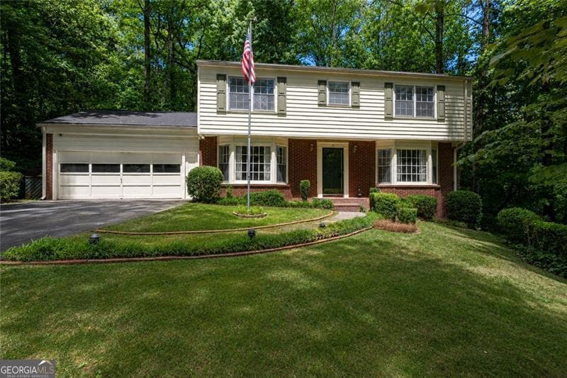4 bedroom, 2.5 bathroom, 2,433 sq ft single family residence sold at 92 Brandon Ridge Drive, Sandy Springs, GA 30328