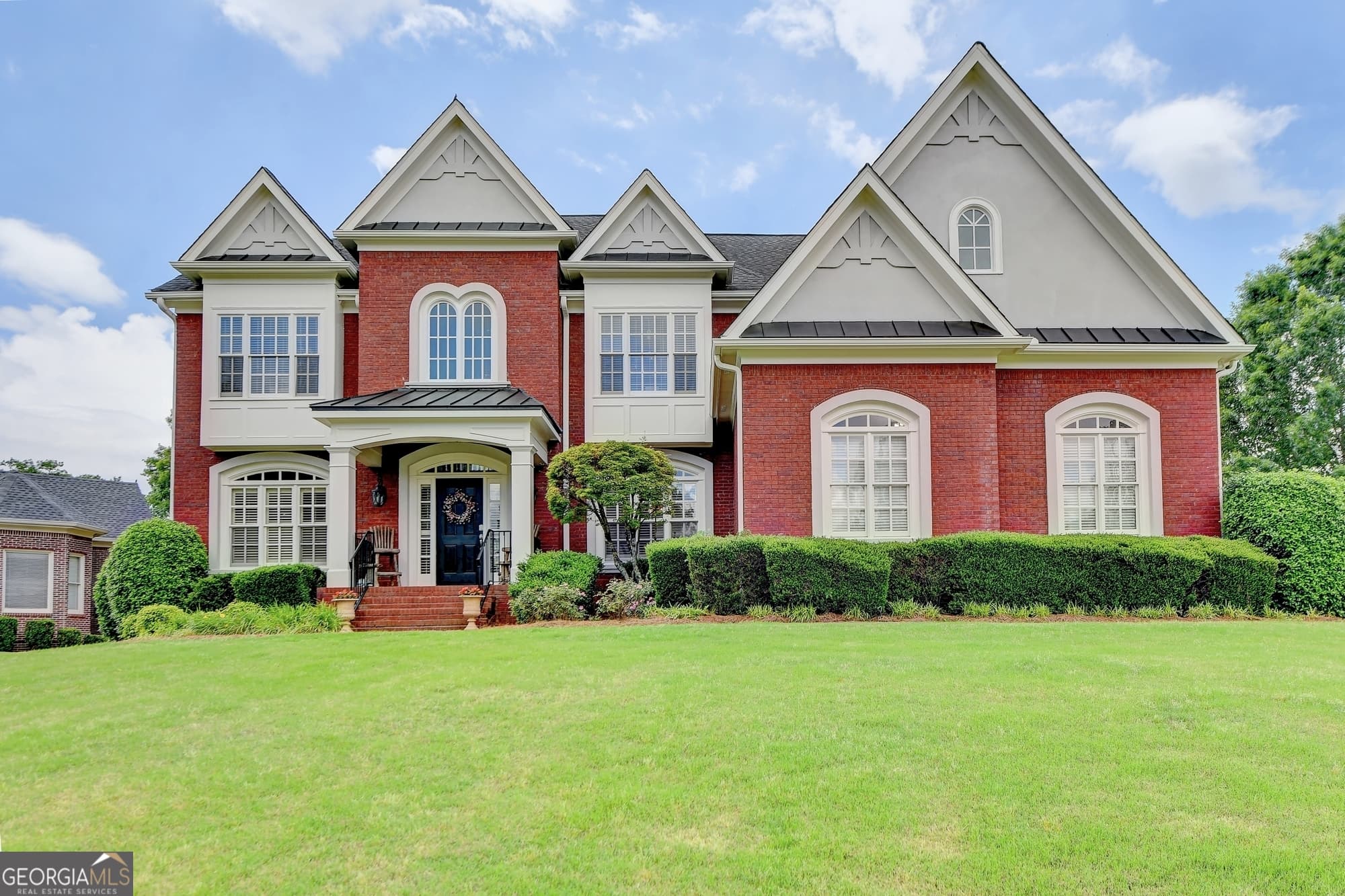 4 bedroom, 4.5 bathroom, 6,373 sq ft single family residence sold at 266 Prestbury Court, Suwanee, GA 30024