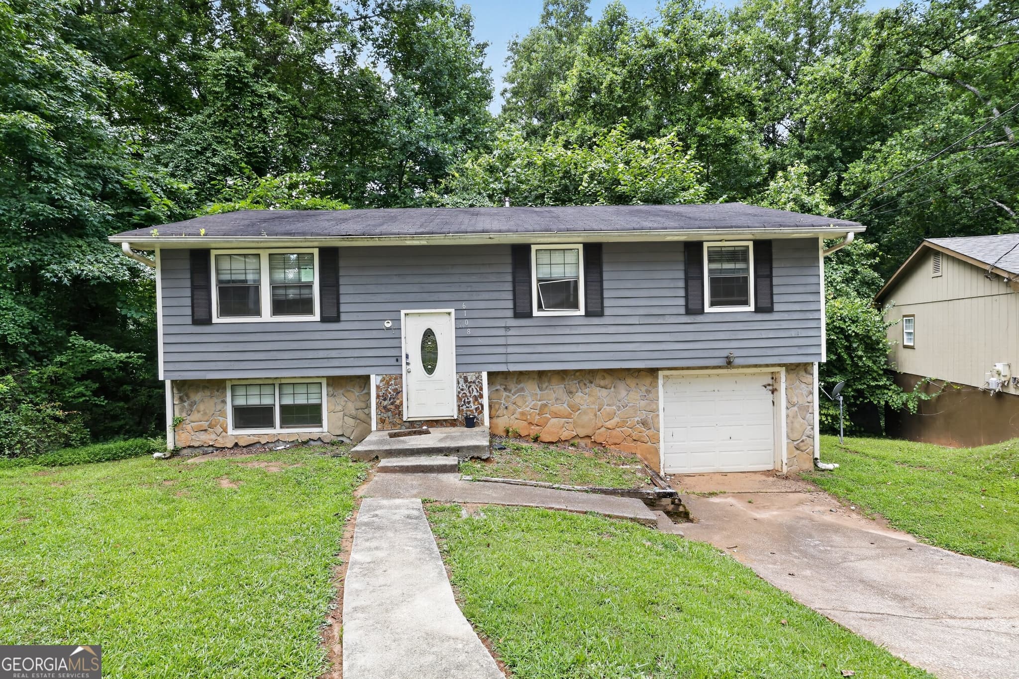 4 bedroom, 2 bathroom, 1,392 sq ft single family residence for sale at 6108 Cherokee Valley Way, Lithonia, GA 30058