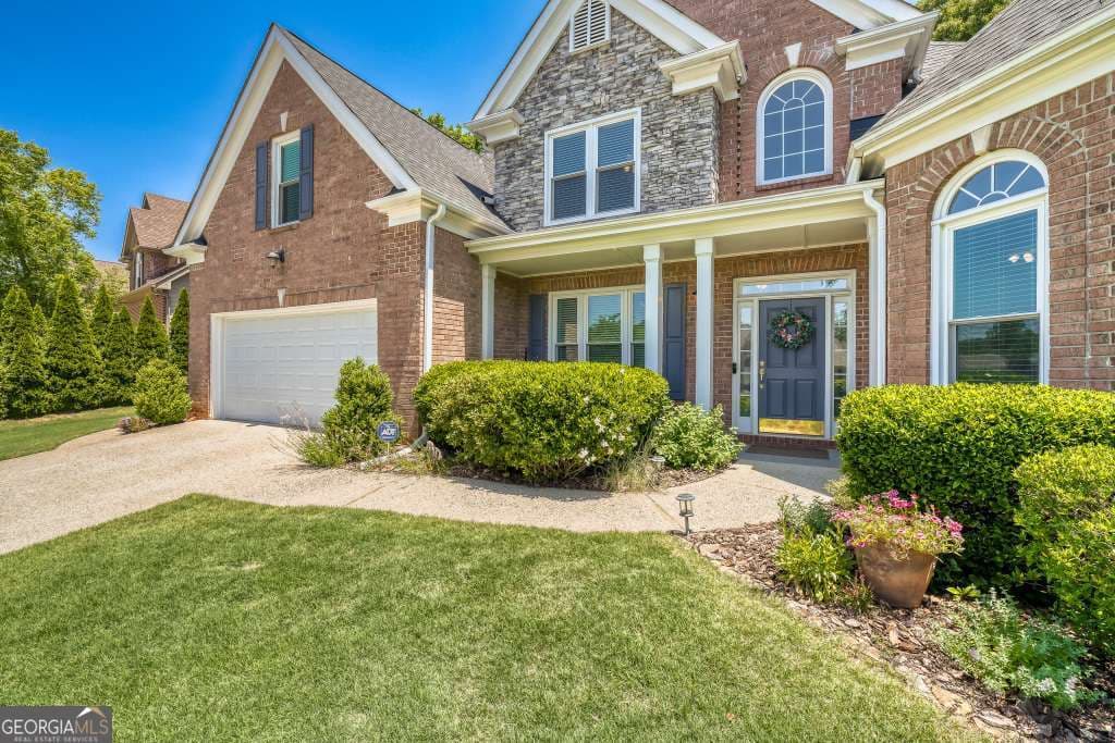 4 bedroom, 2.5 bathroom, 2,855 sq ft single family residence sold at 3673 Lake Edge Drive, Suwanee, GA 30024