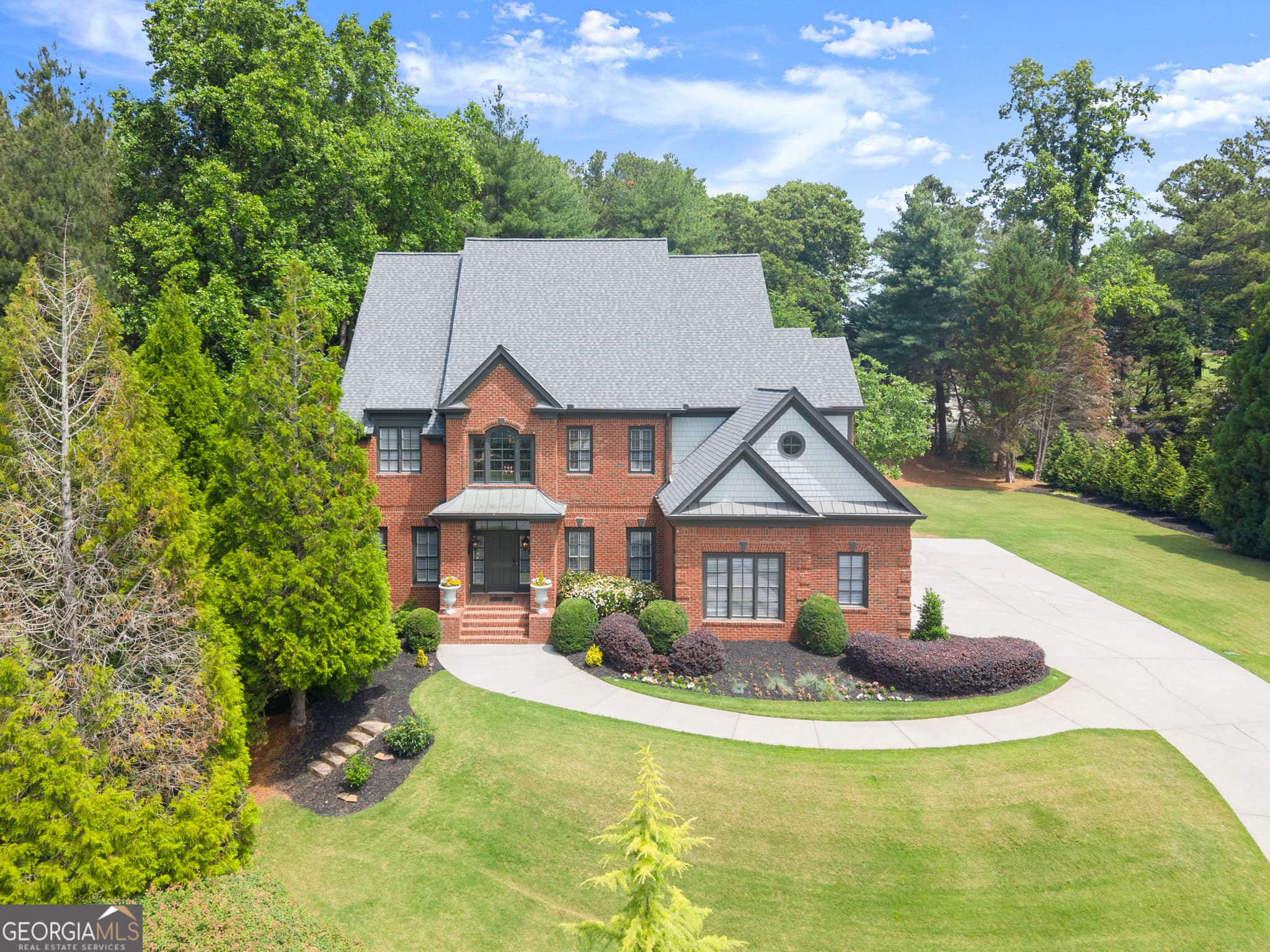 6 bedroom, 5 bathroom, 5,985 sq ft single family residence sold at 235 Atlanta Providence Court, Milton, GA 30004