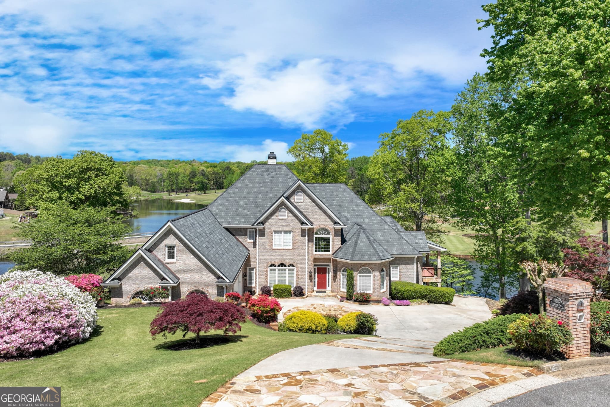 5 bedroom, 6.5 bathroom, 6,432 sq ft single family residence sold at 4613 Blakeford Court, Flowery Branch, GA 30542