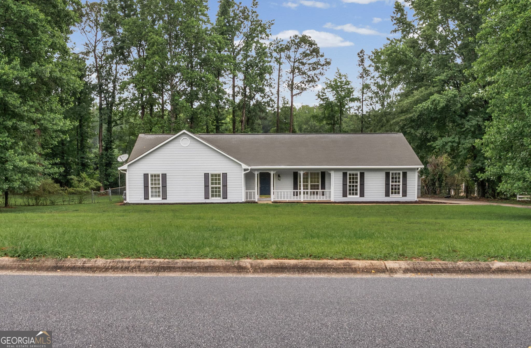 3 bedroom, 2 bathroom, 1,679 sq ft single family residence for sale at 60 London Lane, Sharpsburg, GA 30277