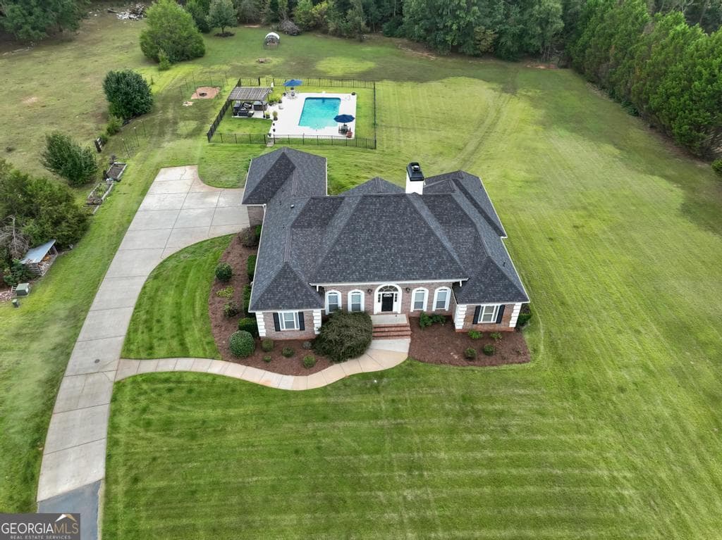 5 bedroom, 4.5 bathroom, 5,570 sq ft single family residence for sale at 760 Singley Drive, Locust Grove, GA 30248