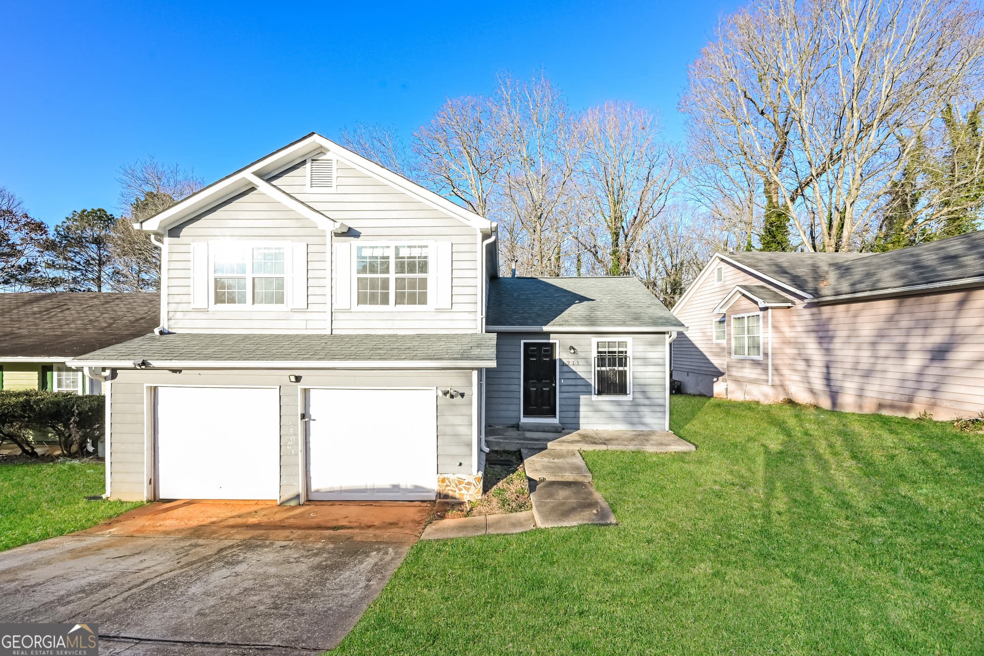 3 bedroom, 2.5 bathroom, 1,400 sq ft single family residence for sale at 1211 To Lani Court, Stone Mountain, GA 30083