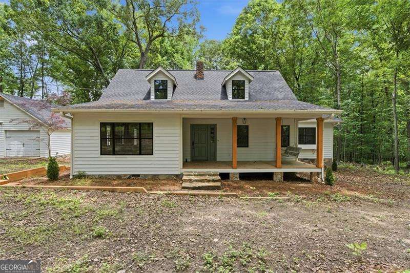 3 bedroom, 3 bathroom, 2,432 sq ft cabin,single family residence sold at 214 Bruce Road, Douglasville, GA 30134