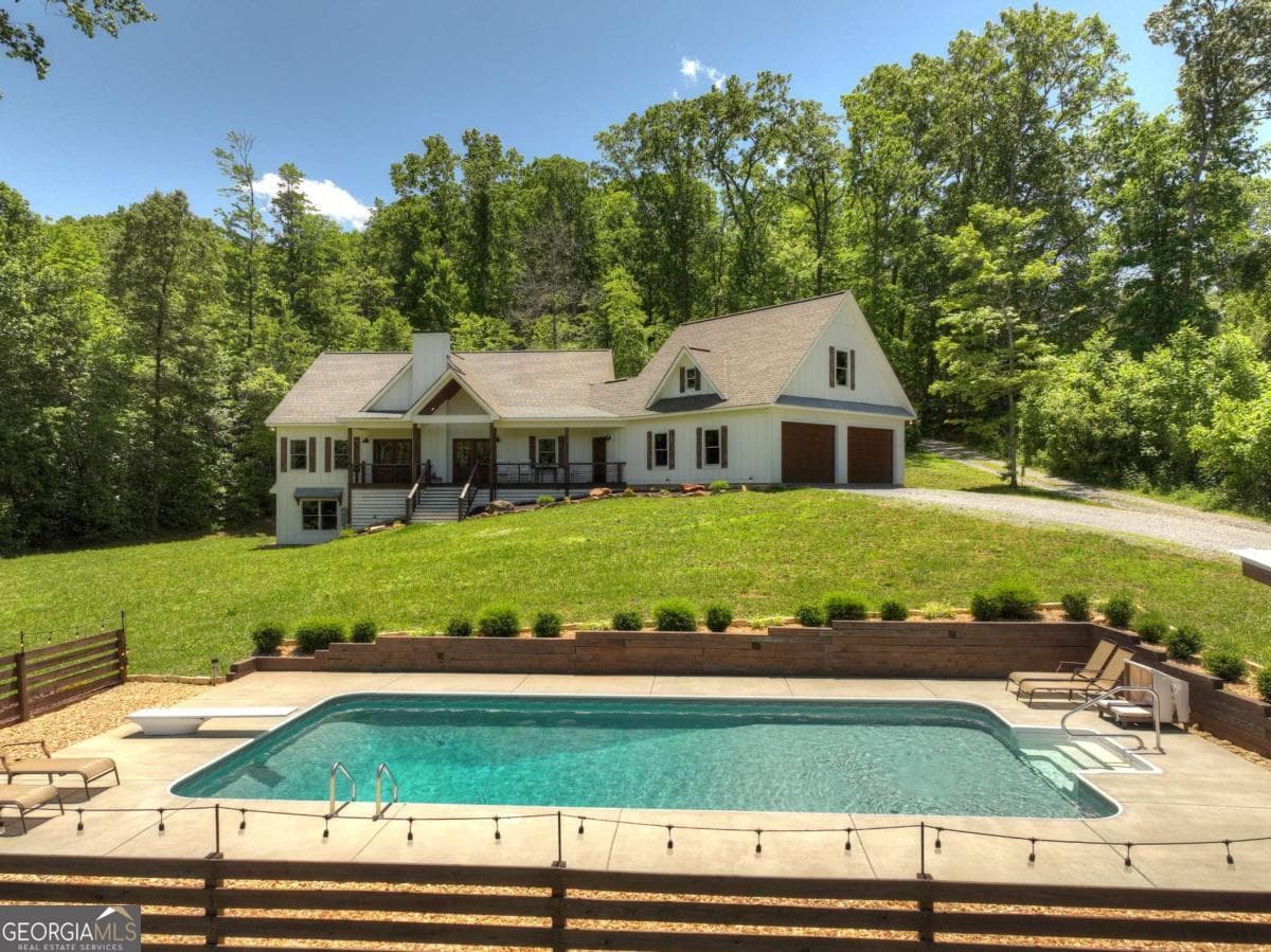4 bedroom, 4.5 bathroom, 5,200 sq ft single family residence sold at 3181 Sugar Creek Road, Blue Ridge, GA 30513