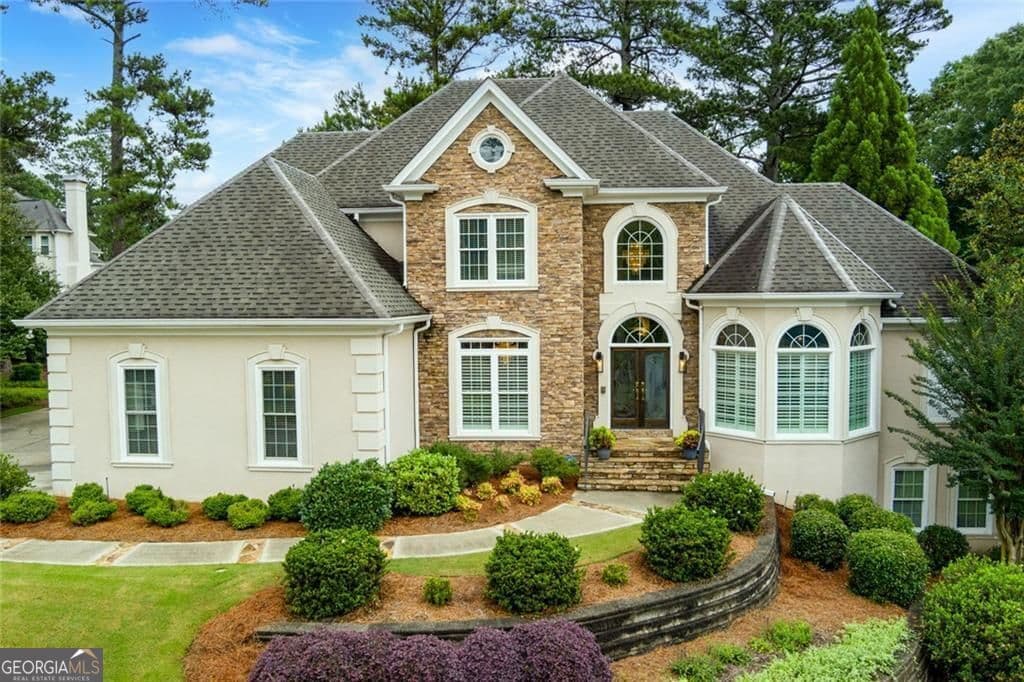 6 bedroom, 4.5 bathroom, 6,106 sq ft single family residence sold at 4828 Old Timber Ridge Road, Marietta, GA 30068
