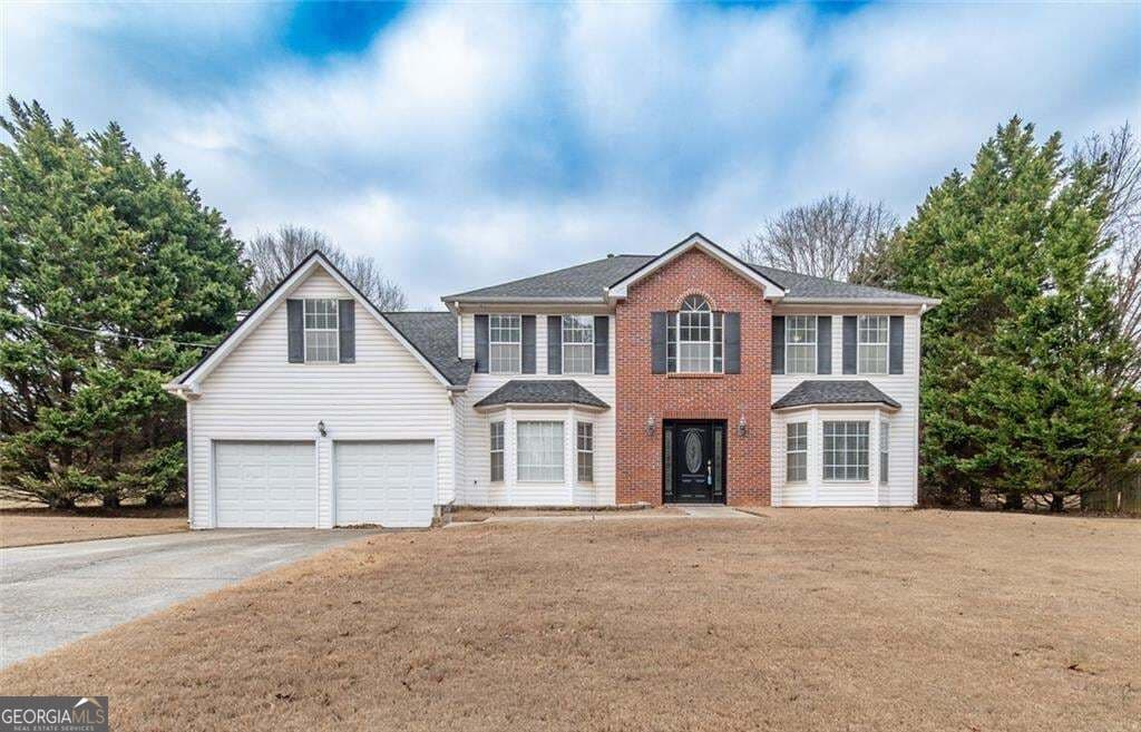 4 bedroom, 2.5 bathroom, 2,869 sq ft single family residence for sale at 2167 Pixie Rose Lane, Loganville, GA 30052