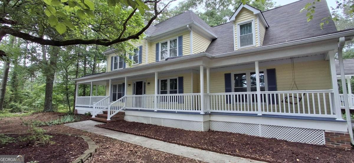 4 bedroom, 2.5 bathroom, 2,410 sq ft single family residence sold at 3660 NE Laurel Lane, Conyers, GA 30012