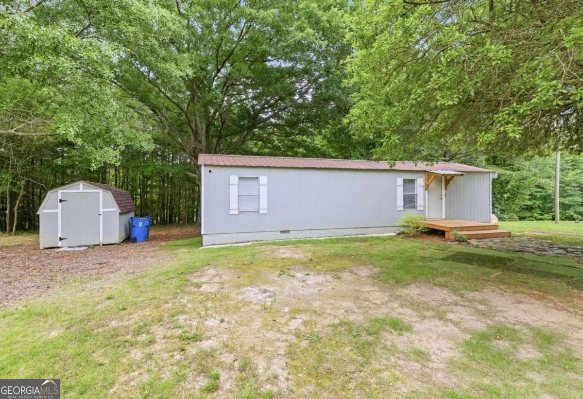 2 bedroom, 1 bathroom manufactured home,single family residence sold at 1386 Etheridge Drive, Auburn, GA 30011