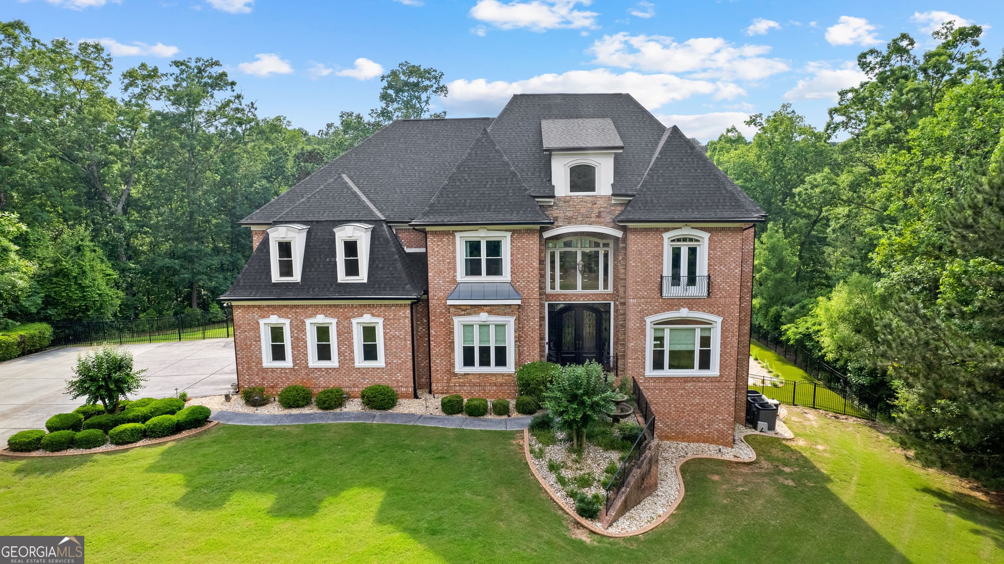 6 bedroom, 6.5 bathroom, 8,183 sq ft single family residence sold at 4320 Blue Ridge Drive, Douglasville, GA 30135