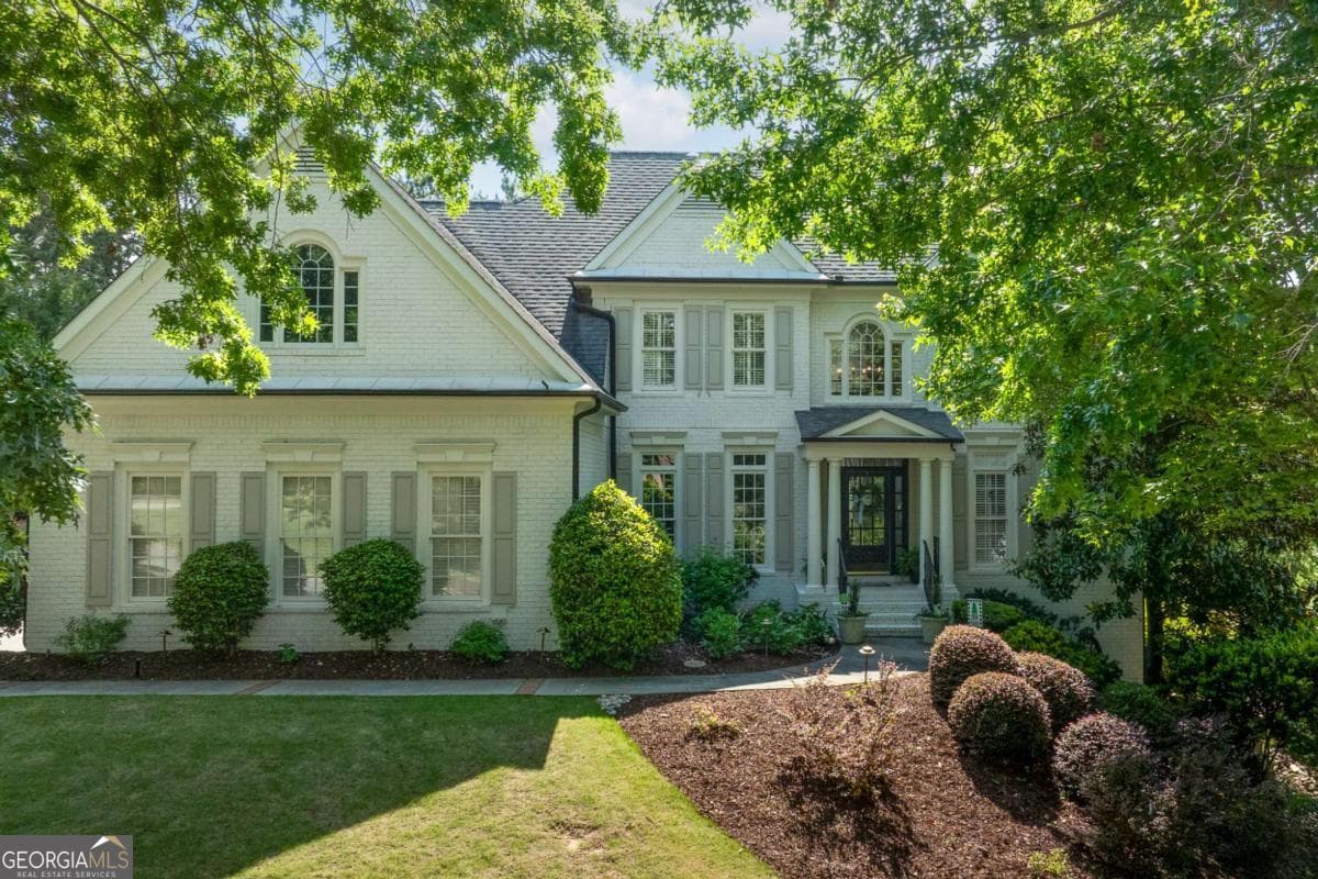 6 bedroom, 5 bathroom, 3,282 sq ft single family residence sold at 1039 Windermere Crossing, Cumming, GA 30041