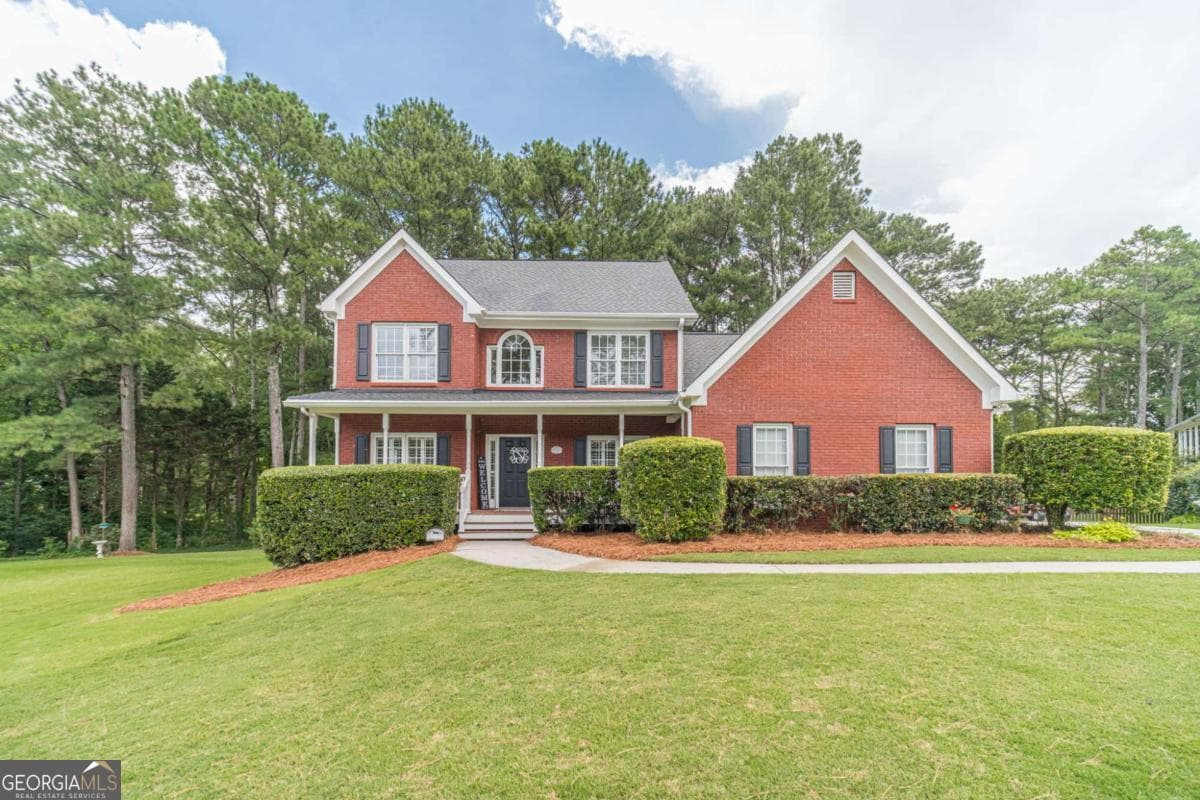 4 bedroom, 2.5 bathroom, 2,666 sq ft single family residence for sale at 2190 Rosie Lane, Snellville, GA 30078