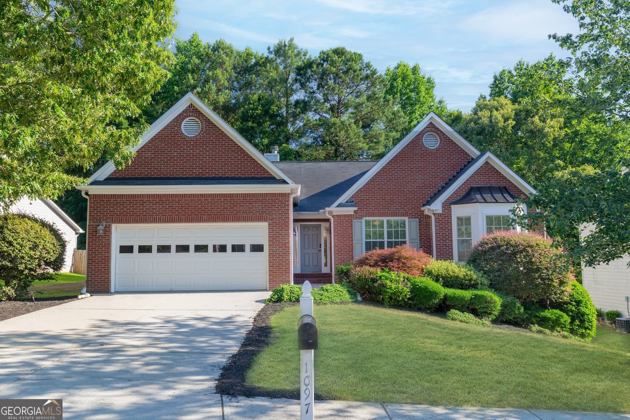 3 bedroom, 2 bathroom, 2,488 sq ft single family residence sold at 1097 Quiet Waters Lane, Lawrenceville, GA 30045