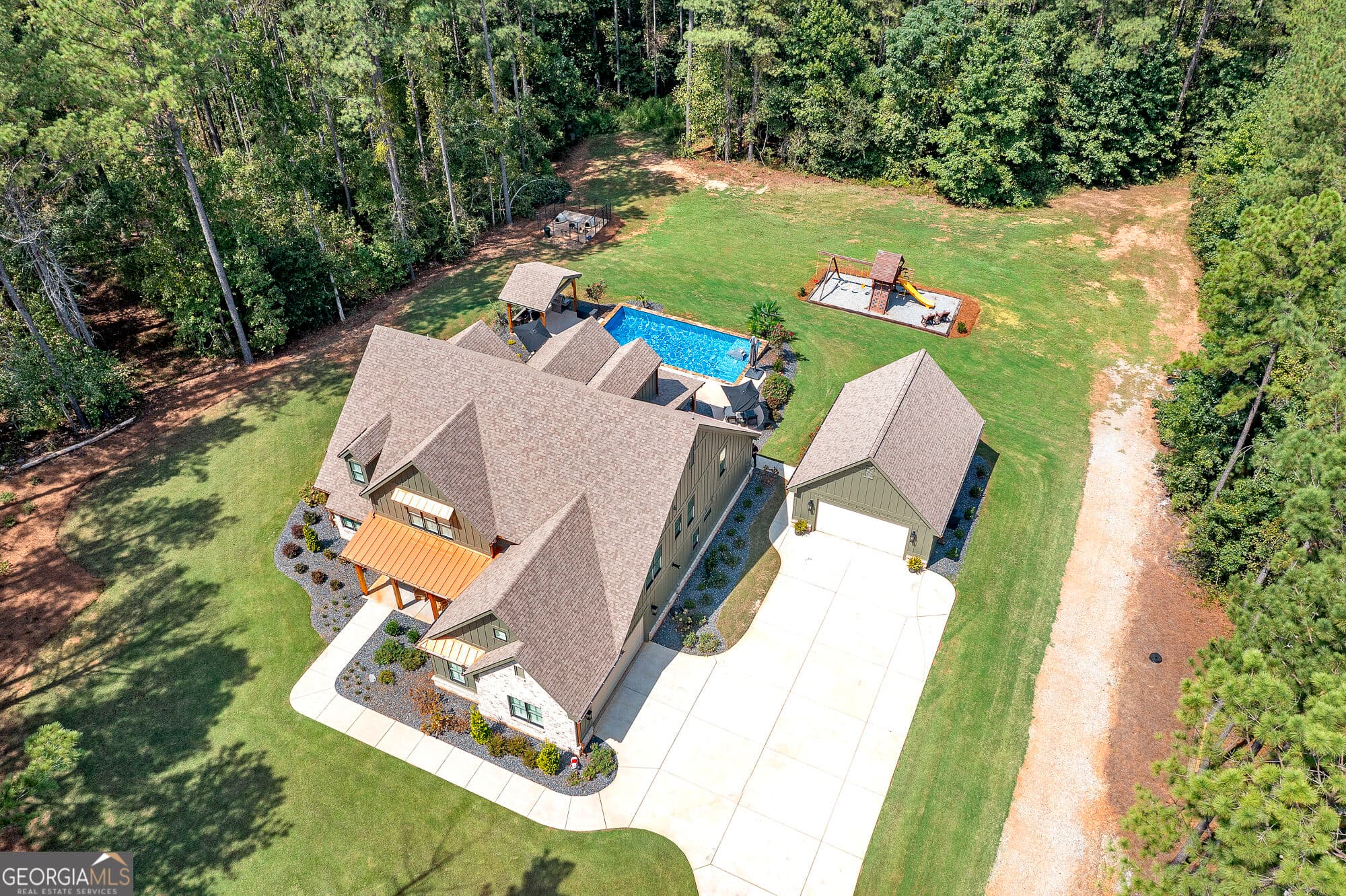 5 bedroom, 4 bathroom, 4,200 sq ft single family residence for sale at 478 Blue Store Road, Forsyth, GA 31029