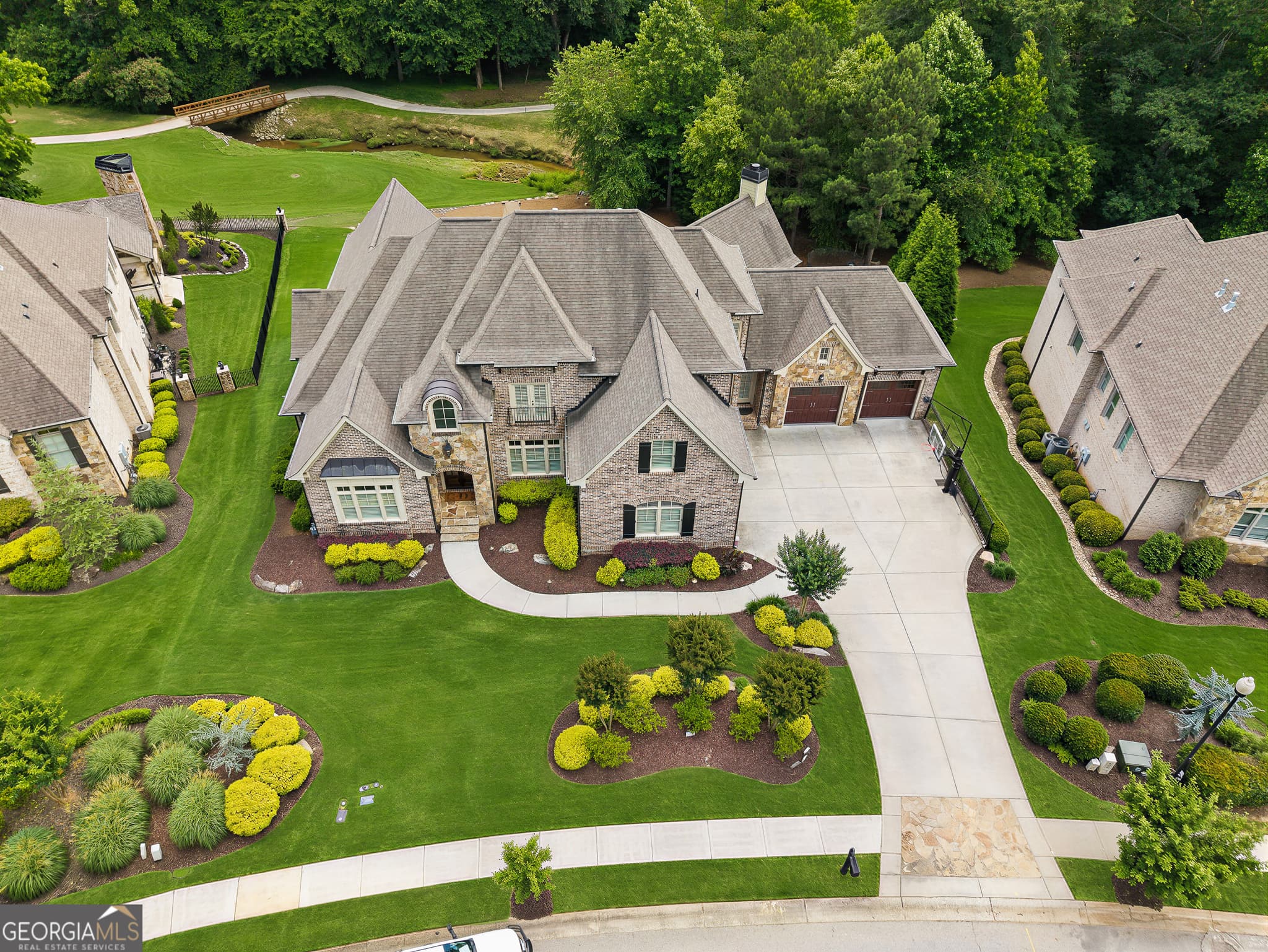 5 bedroom, 6 bathroom, 8,448 sq ft single family residence sold at 5921 Yoshino Cherry Lane, Braselton, GA 30517