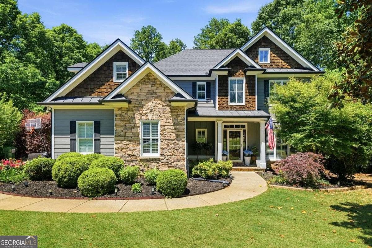 4 bedroom, 4.5 bathroom, 4,276 sq ft single family residence sold at 124 Carney Drive, Ball Ground, GA 30107