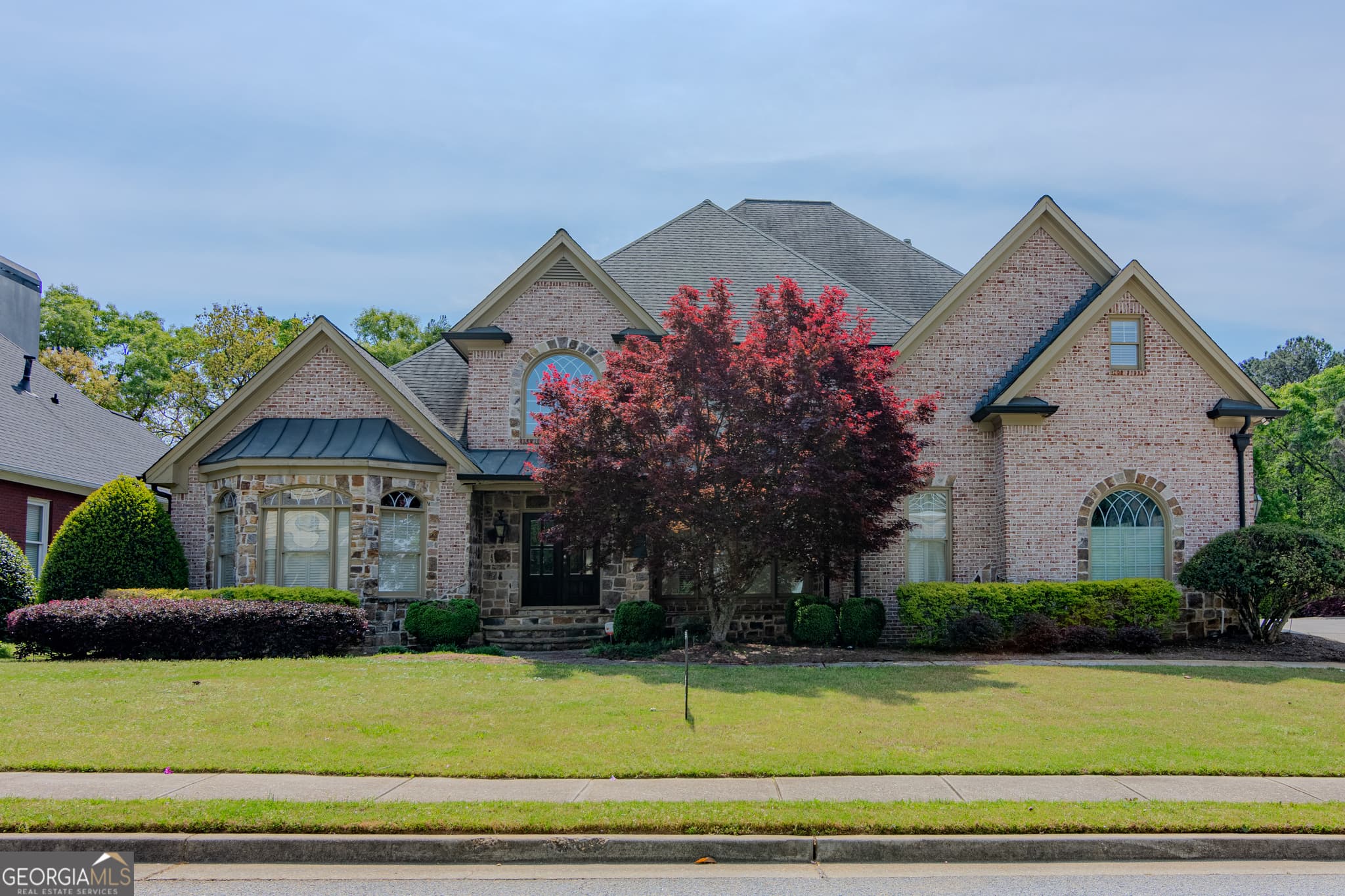 5 bedroom, 5.5 bathroom, 8,430 sq ft single family residence for sale at 818 Natchez Valley Trace, Grayson, GA 30017