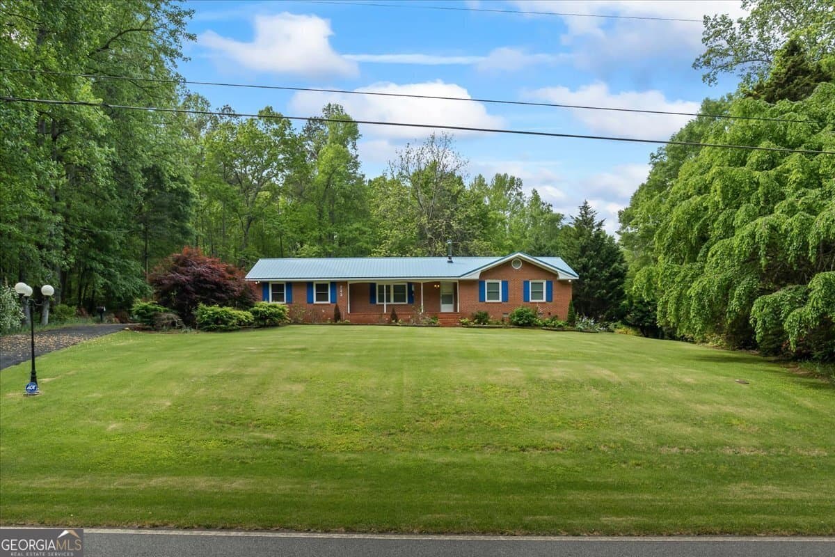 3 bedroom, 2 bathroom, 1,876 sq ft single family residence sold at 725 & 761 School Road, Hampton, GA 30228