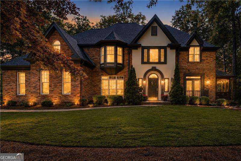4 bedroom, 4.5 bathroom, 5,878 sq ft single family residence sold at 1136 Mossy Rock Road, Kennesaw, GA 30152