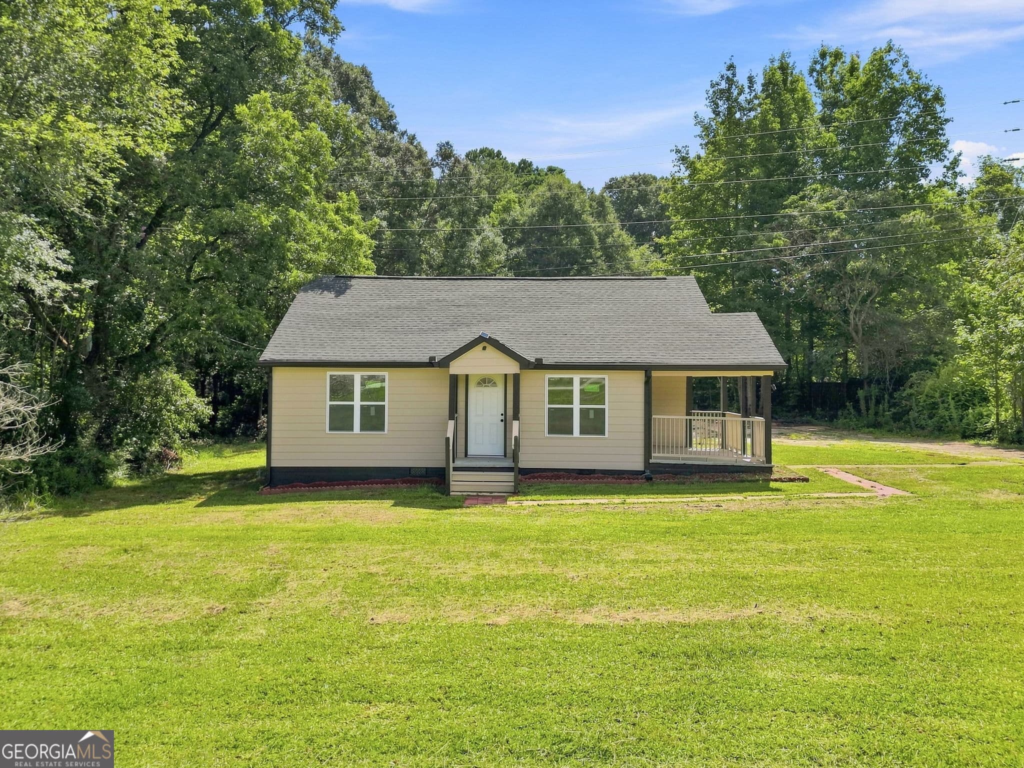 3 bedroom, 1 bathroom, 1,060 sq ft single family residence for sale at 1061 Highway 3, Hampton, GA 30228