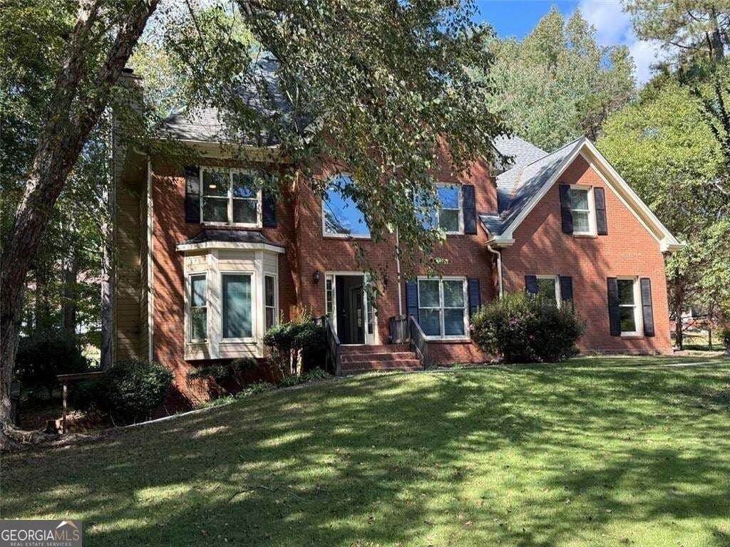 6 bedroom, 3.5 bathroom, 4,146 sq ft single family residence for sale at 2781 Jen Chris Drive, Snellville, GA 30039
